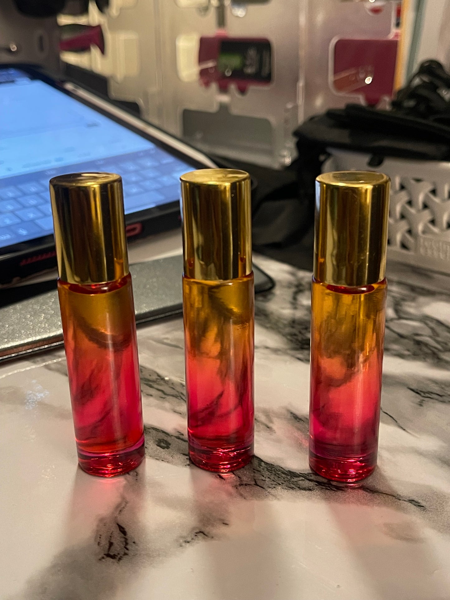 Oshun Cashmere glass rollerball face and body oil.