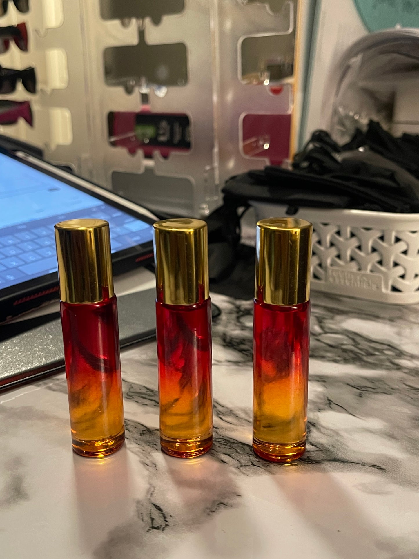 Oshun Cashmere glass rollerball face and body oil.