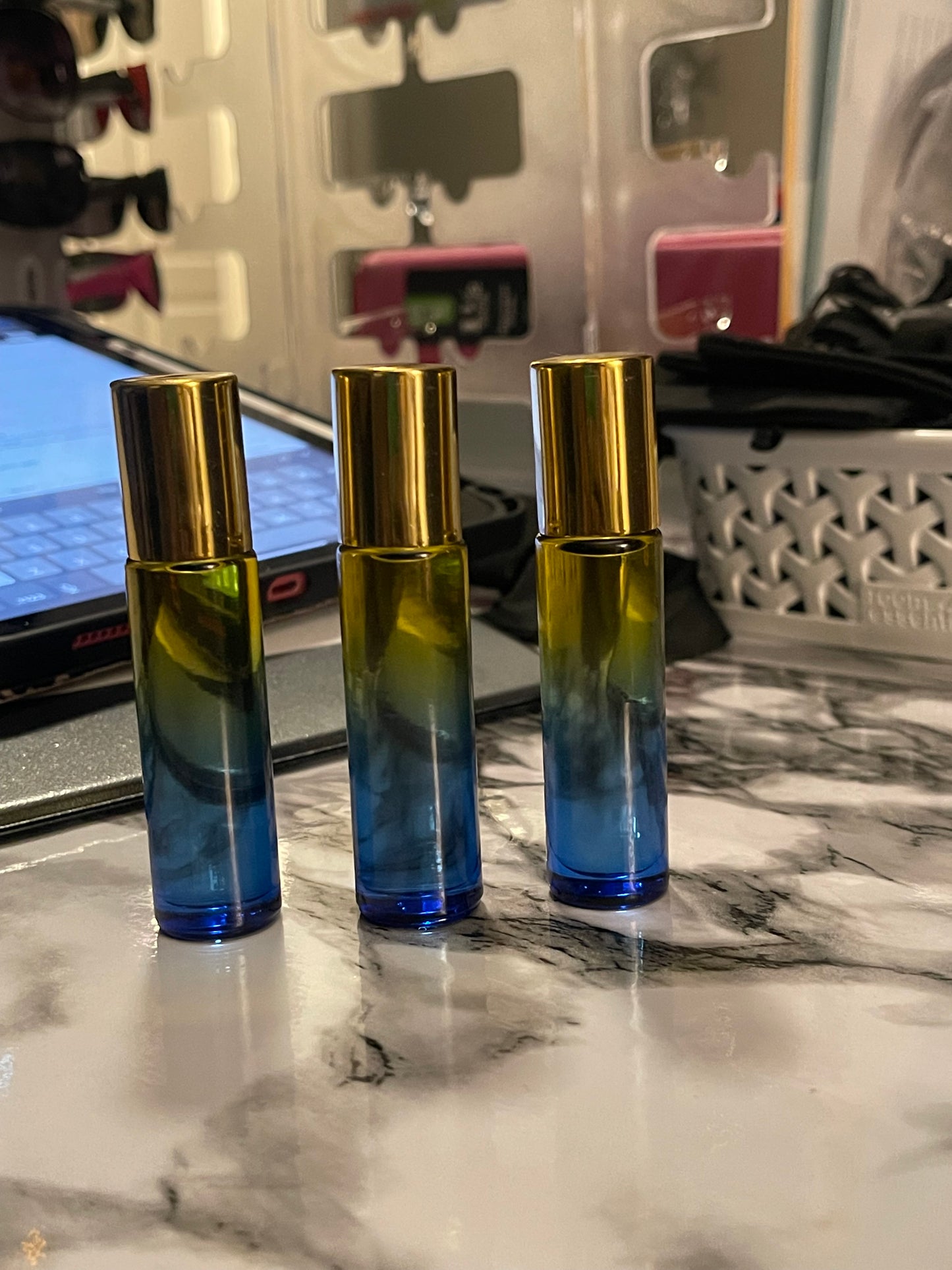 Oshun Cashmere glass rollerball face and body oil.